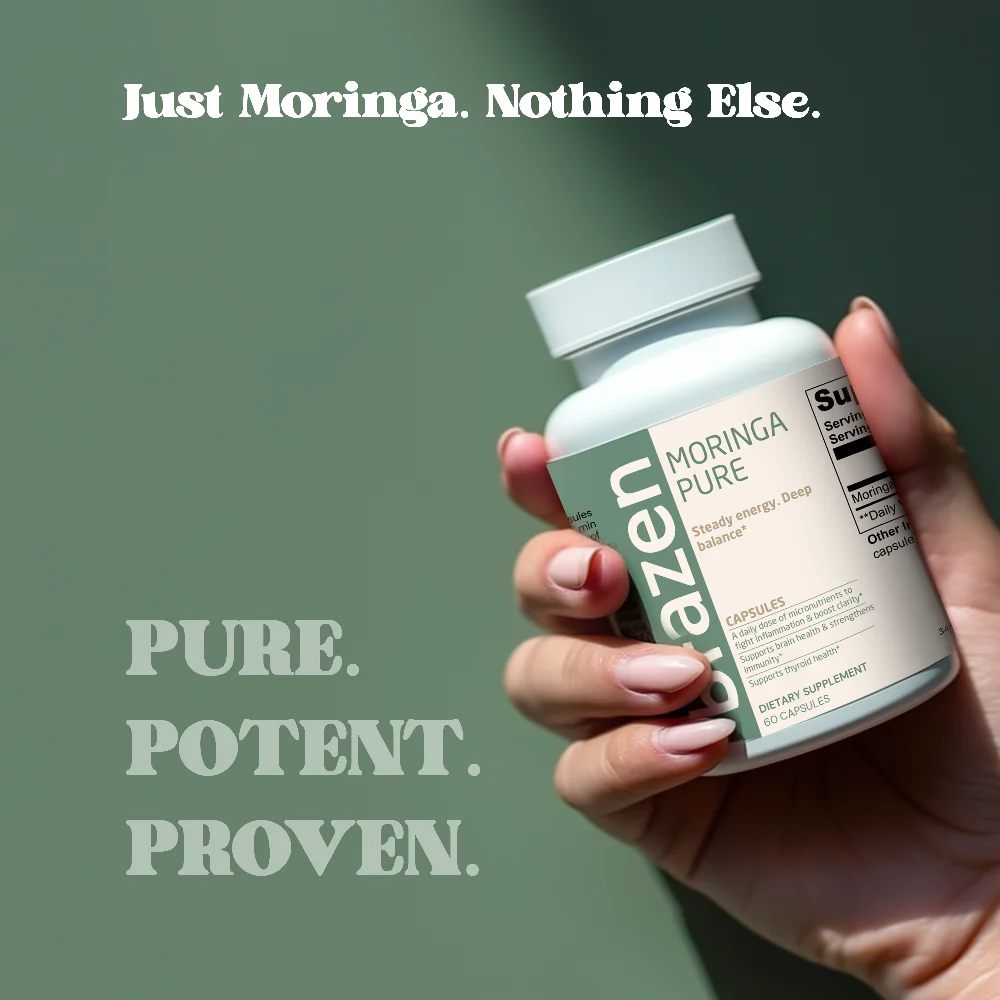 Hand holding a bottle of Brazen Moringa Pure against a green wall