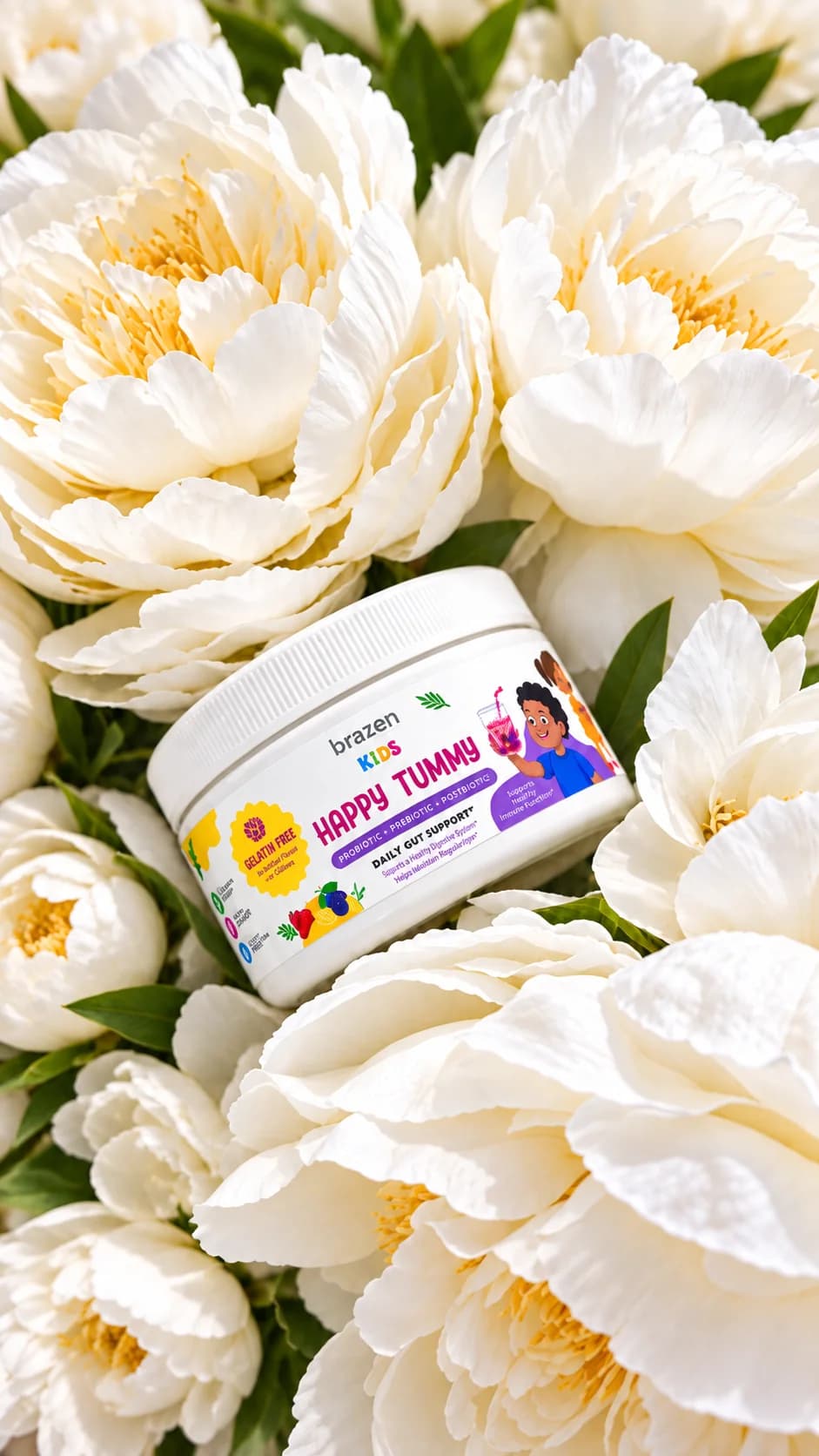 Brazen Kids Happy Tummy tub nestled among white peonies